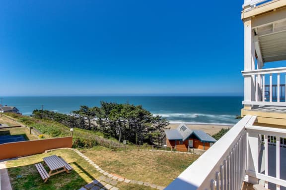 Dog Friendly Condo with Partial Ocean Views Short Walk to the Beach