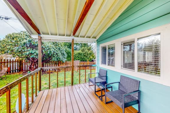 Renovated dog friendly cottage with a covered porch deck yard and washer dryer